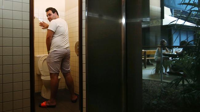 Research has shown that clean, easily accessible public toilet facilities are beneficial to tourism. Alistair Cormack, of Newcastle in England, relieves himself in the first-class facilities at Rattle and . PICTURE: BRENDAN RADKE