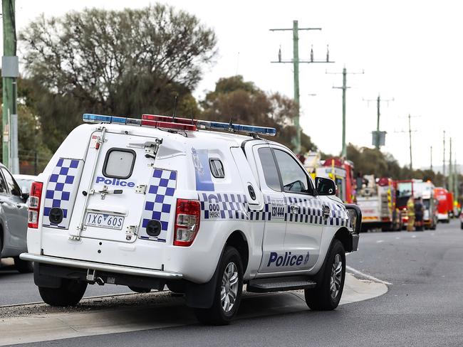 Police at the scene of the explosion where a person was killed. Picture: Ian Currie