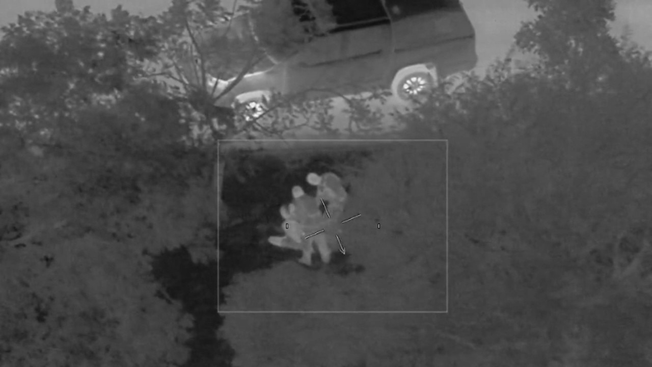 Members of the Townsville Tactical Crime Squad take an alleged violent domestic abuser into custody in a dramatic arrest in Garbutt on Tuesday, as seen from the new police helicopter. Picture: Supplied