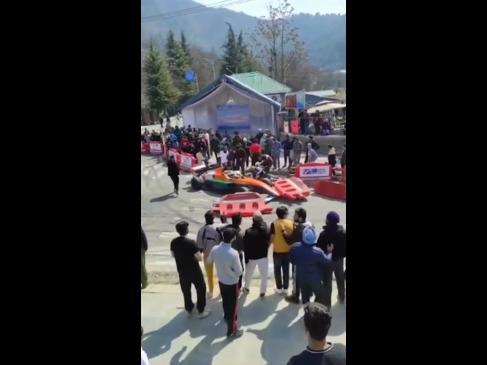 Race car crashes into spectators at rally