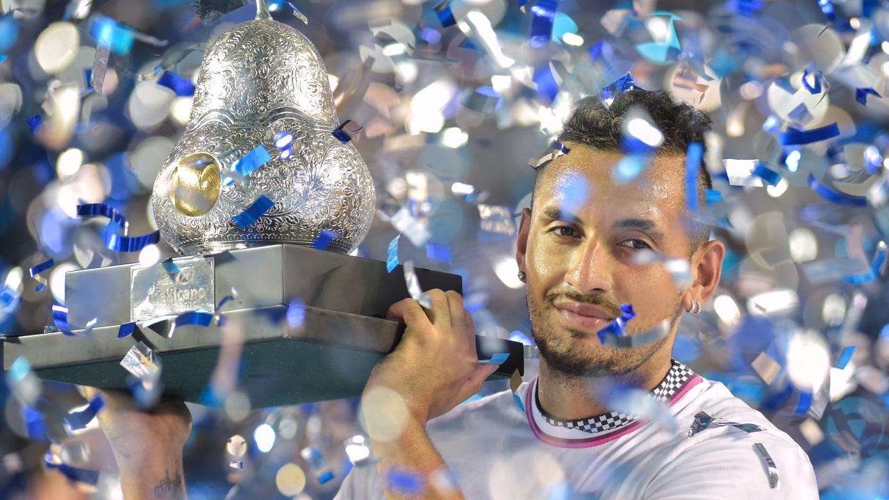 Kyrgios with the Mexican Open pear trophy.