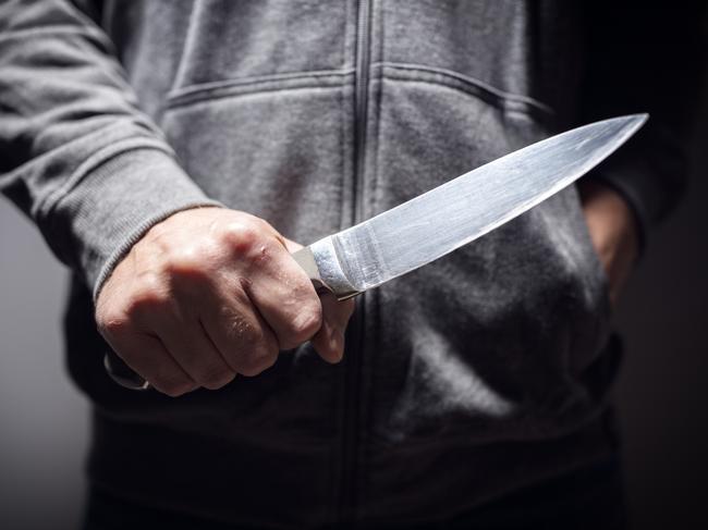 Generic crime Istock  -  Criminal with knife weapon threatening to stab