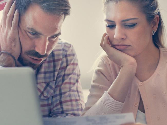 A couple having problem with bills and money. Generic relationships, laptop, expenses. Picture: iStock.