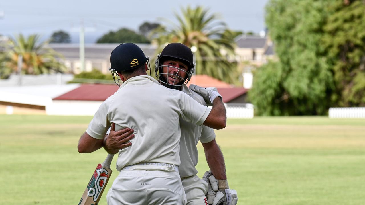 St Joseph's’ Jono Casey is congratulated by Tom Smith after making his maiden first grade century. Picture: Wes Cusworth