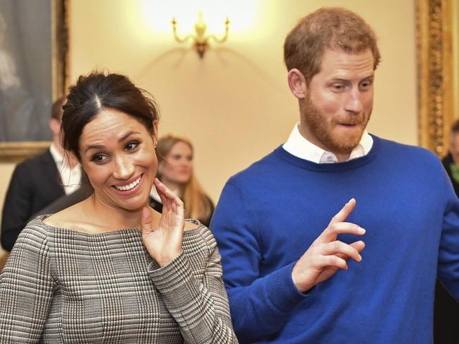 Britain’s Prince Harry and Meghan Markle speak to people in the Drawing Room of Cardiff Castle in Cardiff, Wales, Thursday, Jan. 18, 2018. Picture: AP