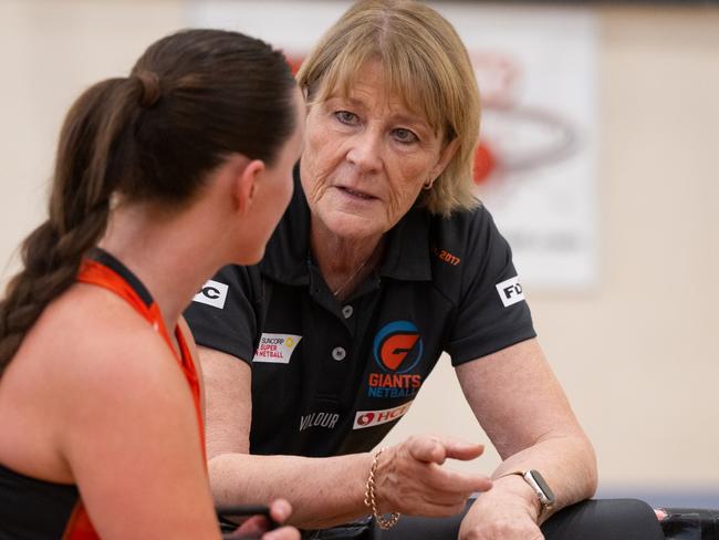 Giants head coach talks to rookie Hope White at a pre-season game. Picture: Ryan Jones/GIANTS Netball