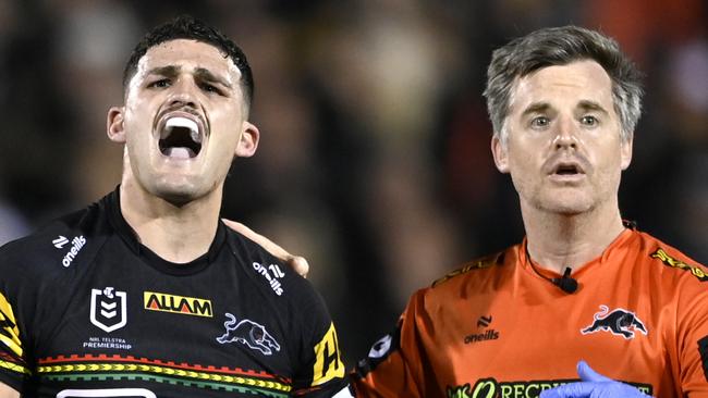 Nathan Cleary leaves the field in pain after injuring his shoulder against the Storm. Picture: NRL Imagery