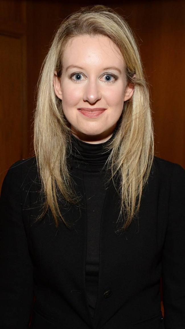 Elizabeth Holmes in her signature black turtleneck, modeled after Steve Jobs.