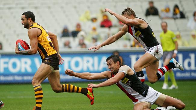 Burgoyne leaves St. Kilda's Billy Longer and Clint Jones in his wake.