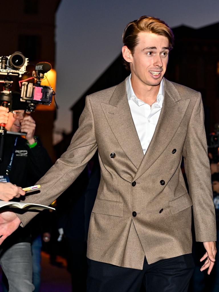 Alex de Minaur on the blue carpet. Photo by Diego Puletto/Getty Images.