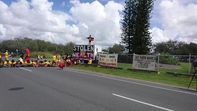 Indigenous protesters halt the Queen's Baton on the Gold Coast