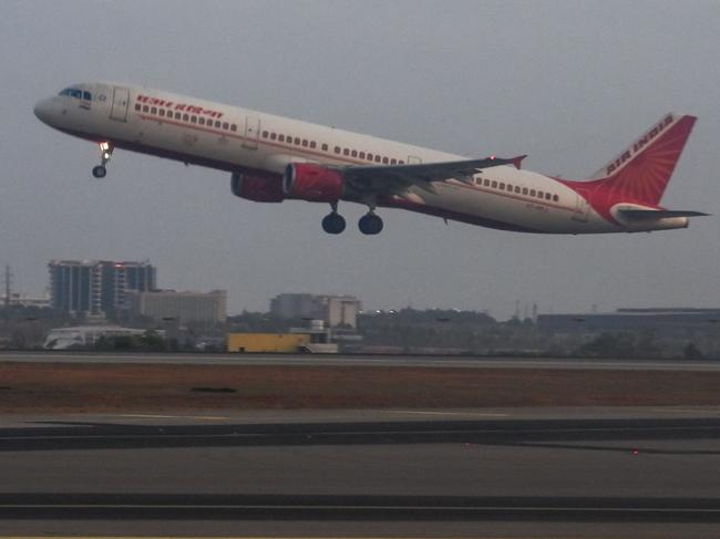An Air India aircraft takes off at Kempegowda International Airport in Bengaluru on April 12, 2024. (Photo by Idrees MOHAMMED / AFP)
