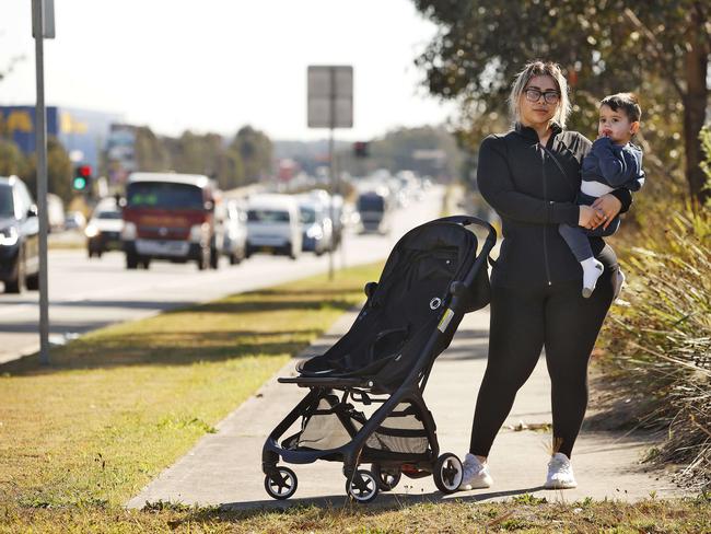 Sarah Kalousian with her son Anthony on a footpath to nowhere in Colebee. Picture: Sam Ruttyn