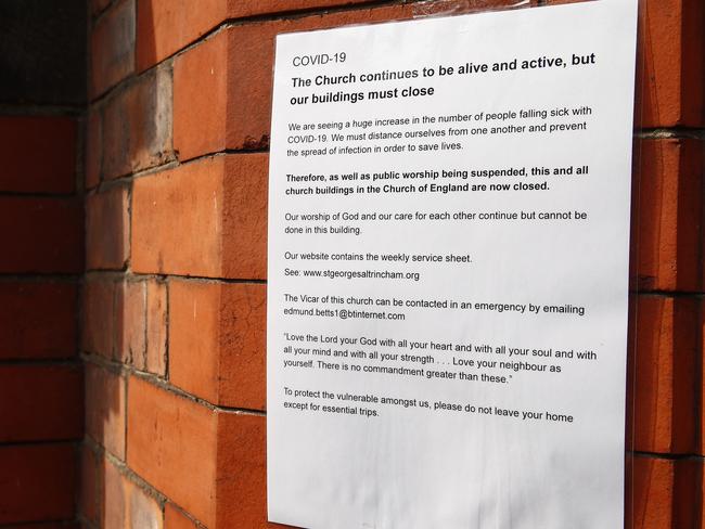 A notice on the doors of an Anglican church in the UK advises public worshipping has been suspended. Picture: Getty