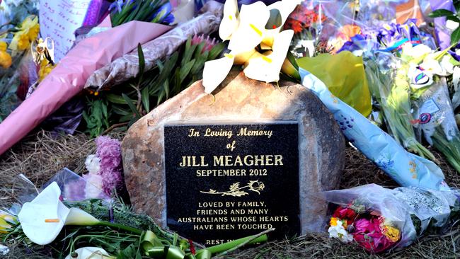 Flowers and a plaque mark the site of Jill Meagher’s shallow grave on Blackhill Rd.