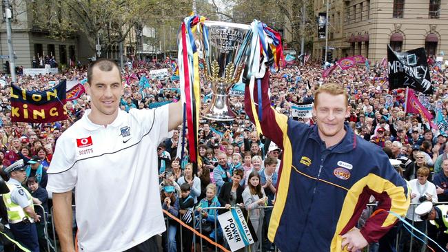 Warren Tredrea and Michael Voss during AFL Grand Final parade in 2004. Picture: HWT Library.