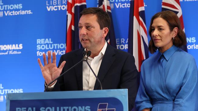 Matthew Guy arrives with wife Renae to speak to supporters after his defeat. Picture: David Caird