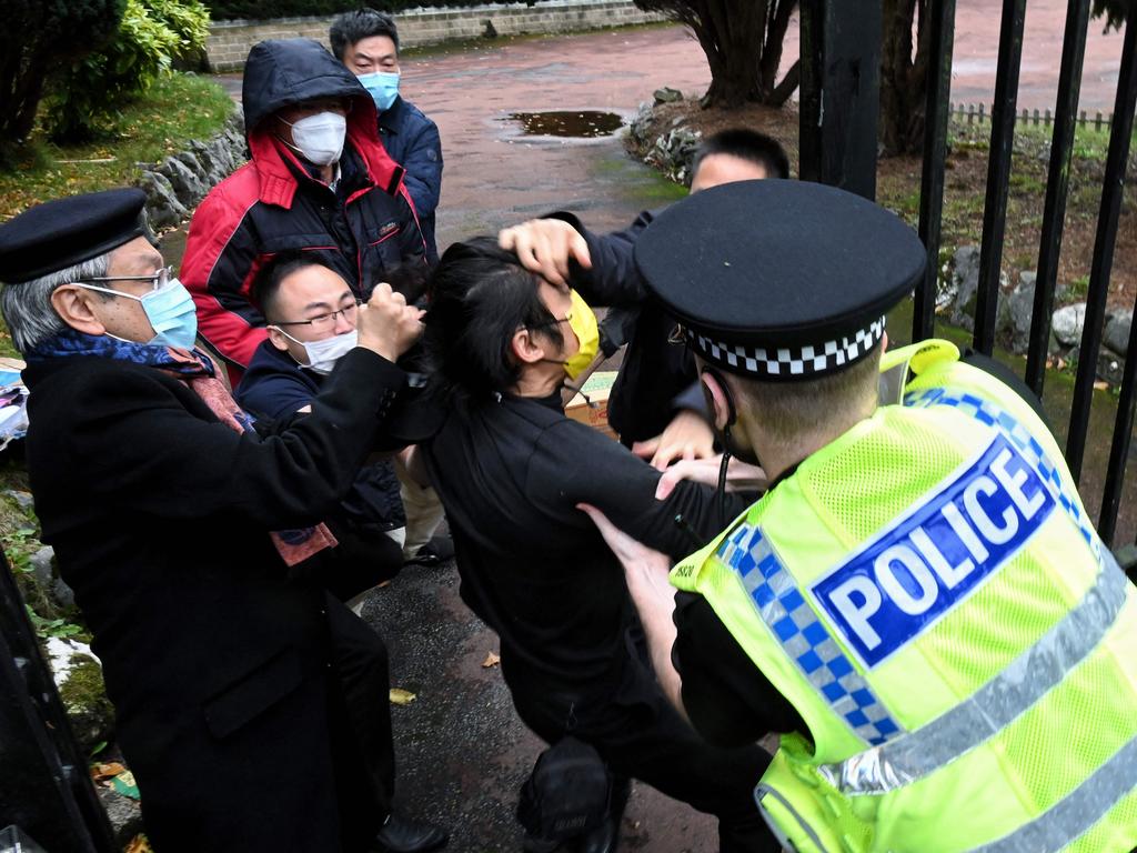 Consulate staff scuffle with protesters. Picture: Matthew Leung/The Chaser News/AFP