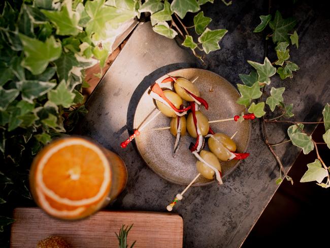 Olive, pepper and white anchovy sticks, from La Sardina Loca, is one of the many tapas dishes on offer at the newly re-opened In the Hanging Garden. Picture: ROSIE HASTIE/DARKLAB MEDIA