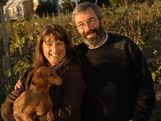 Prue and Stephen Henschke of Henschke winery — with pet dog Cassia in the Hill of Grace vineyard.