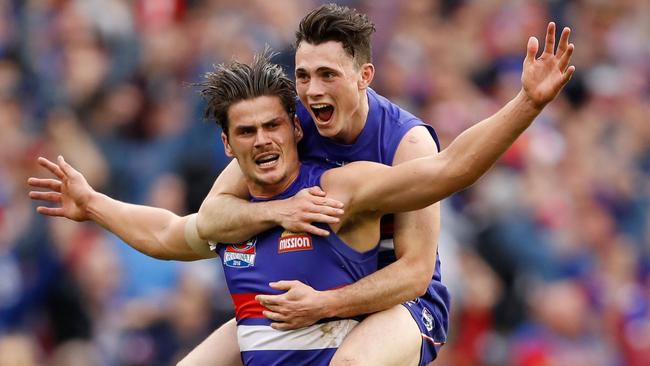 Toby McLean jumps on teammates Tom Boyd in the 2016 Grand Final. Picture: Getty Images