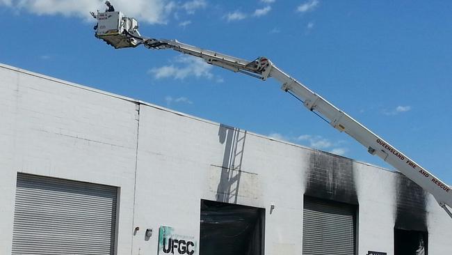 Fire and rescue investigators using cherry picker to inspect the damage from above PHOTO Scott Fletcher