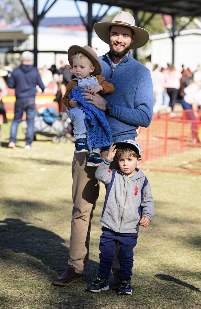 Anthony Vadalma with sons (left) Ezekiel and Mathias Vadalma at Sadie's Day Out, a special community event to celebrate the life of five-year-old crash victim Sadie, held at Cambooya State School, Saturday, June 7, 2025. Picture: Kevin Farmer