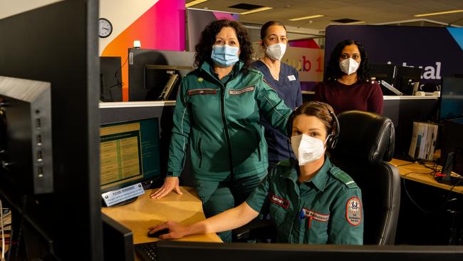 Diverting the non-emergency calls to more appropriate care: team leader Joanne Johns and paramedic Courtney Halliday, and behind, clinical nurse Adele Vann and physician Dr Jo Janardan are part of the team. Picture: The Advertiser/ Morgan Sette