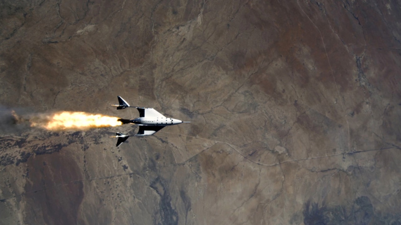 The VSS Unity fires its engines to hurtle towards space.