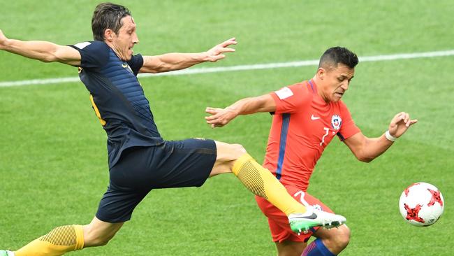 Socceroos Mark Milligan challenges Chile's Alexis Sanchez during the 2017 Confederations Cup in Russia. Picture: AFP