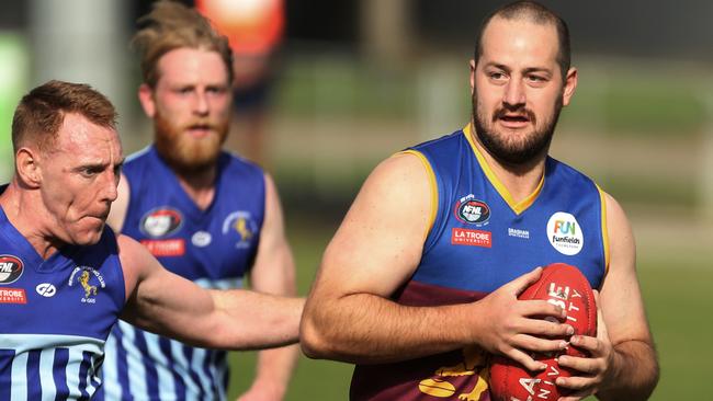 Nathan Stefanile with the ball for South Morang. Picture: Stuart Milligan