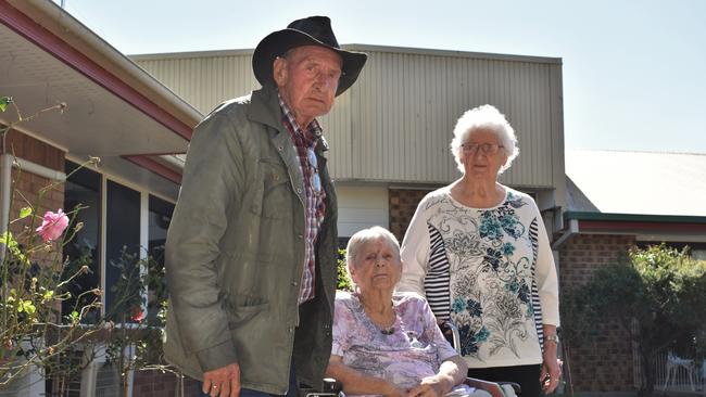 Tarcoola Residents Neil Smith, 84, Betty Shepheard, 91, and Jeanette Grimes, 84, said they were devastated to hear the council planned to move them from their home. Pic: Peta McEachern