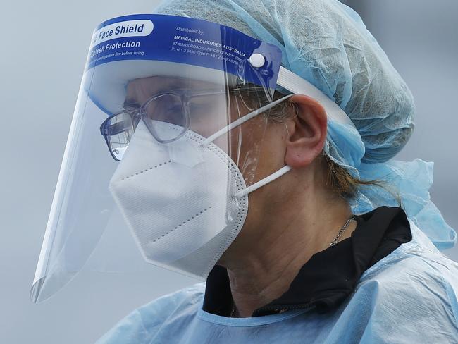 MELBOURNE, AUSTRALIA - NewsWire Photos SEPTEMBER 18, 2020:   Health workers are seen in full PPE at a pop-up COVID19 test site in Clyde, Melbourne, Victoria. Picture: NCA NewsWire / Daniel Pockett