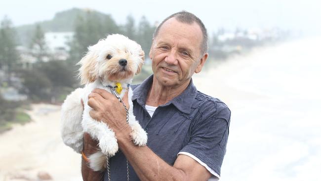 Walter Abrahamson has successfully beaten cancer and is now starting a support group. Photo with his dog Bella.