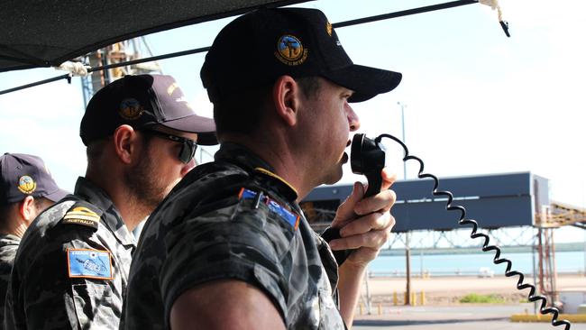 Lieutenant Commander Colin Verheul guides the ship back to shore. Picture: Jason Walls