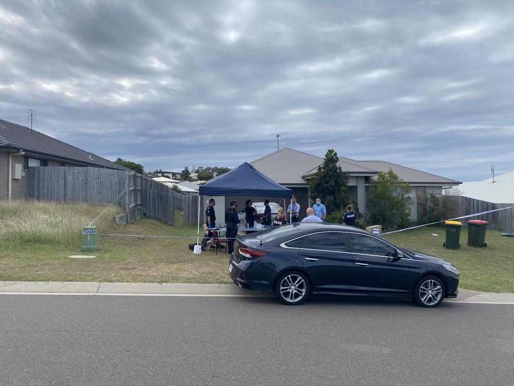 Police remained stationed at 18 Blaxland Court, Glen Eden, Gladstone on Thursday, April 21, 2022.