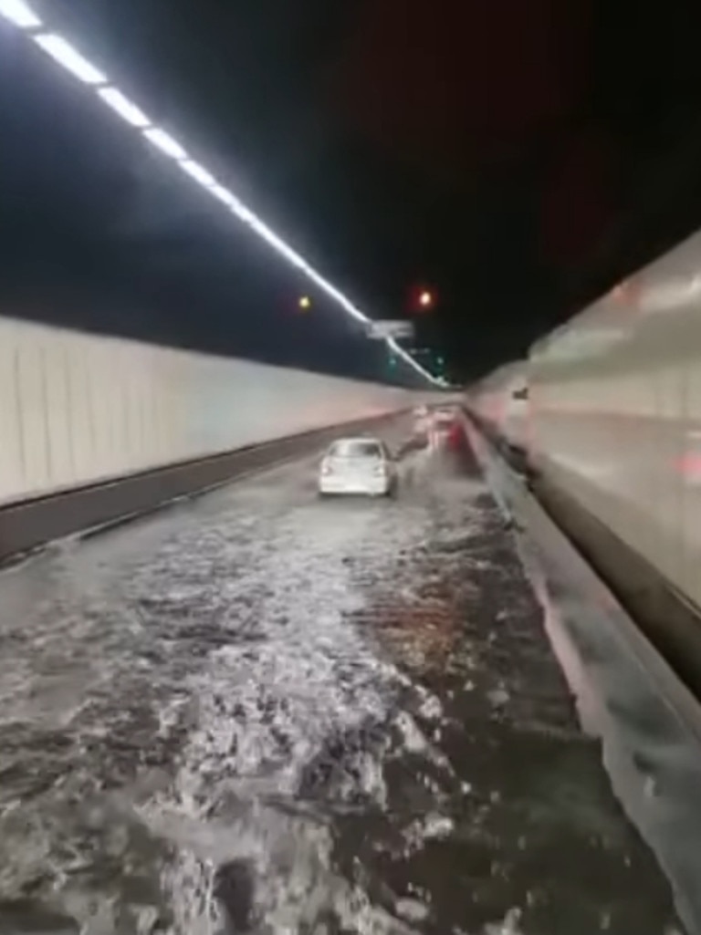 Rainwater floods the M5 tunnel in Sydney. Picture: Facebook