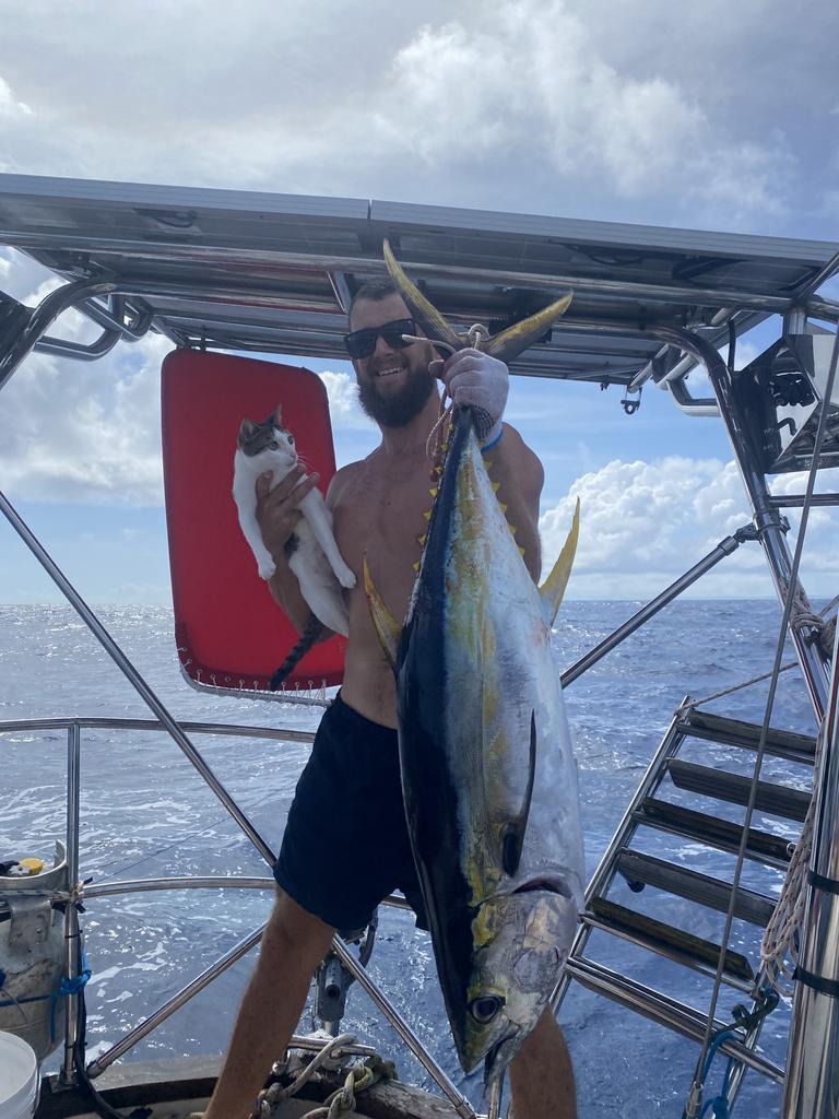 Brett Vlaanderen and Coco getting ready for a fish dinner.