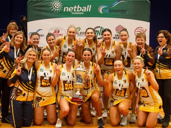 The Northern Hawks lift the state netball premiership trophy after defeating the Cavaliers at Launceston's Silverdome. Picture: PATRICK GEE/SUPPLIED