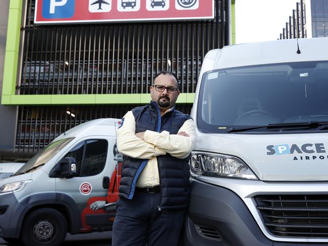 Richard Andary with his lemon Fiat Ducato vans, for which he paid $240,000. Picture: Jonathan Ng