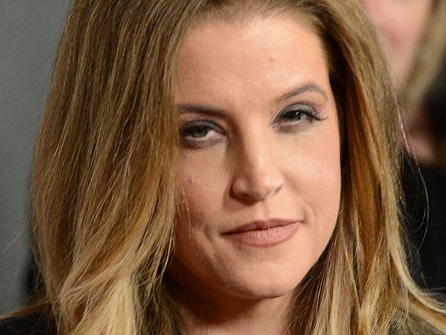 (FILES) In this file photo taken on May 10, 2012 actress Lisa Marie Presley arrives at the NARM Music Biz Awards dinner party held at the Hyatt Regency Century Plaza in Century City, California. - Lisa Marie Presley was rushed to a California hospital January 12, 2023 following cardiac arrest, according to entertainment outlet TMZ. (Photo by Jason Merritt / GETTY IMAGES NORTH AMERICA / AFP)