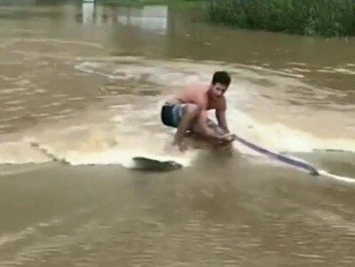 Another man goes waterskiing.