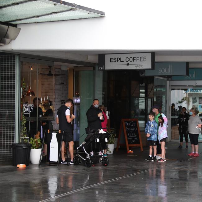 Day three of the Gold Coast lockdown.Large queue for Coffee at Surfers Paradise. . Picture Glenn Hampson