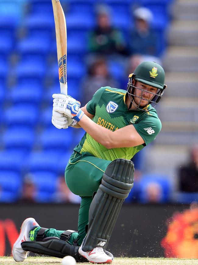 David Miller sweeps during his blistering knock in Hobart against Australia. Picture: AFP