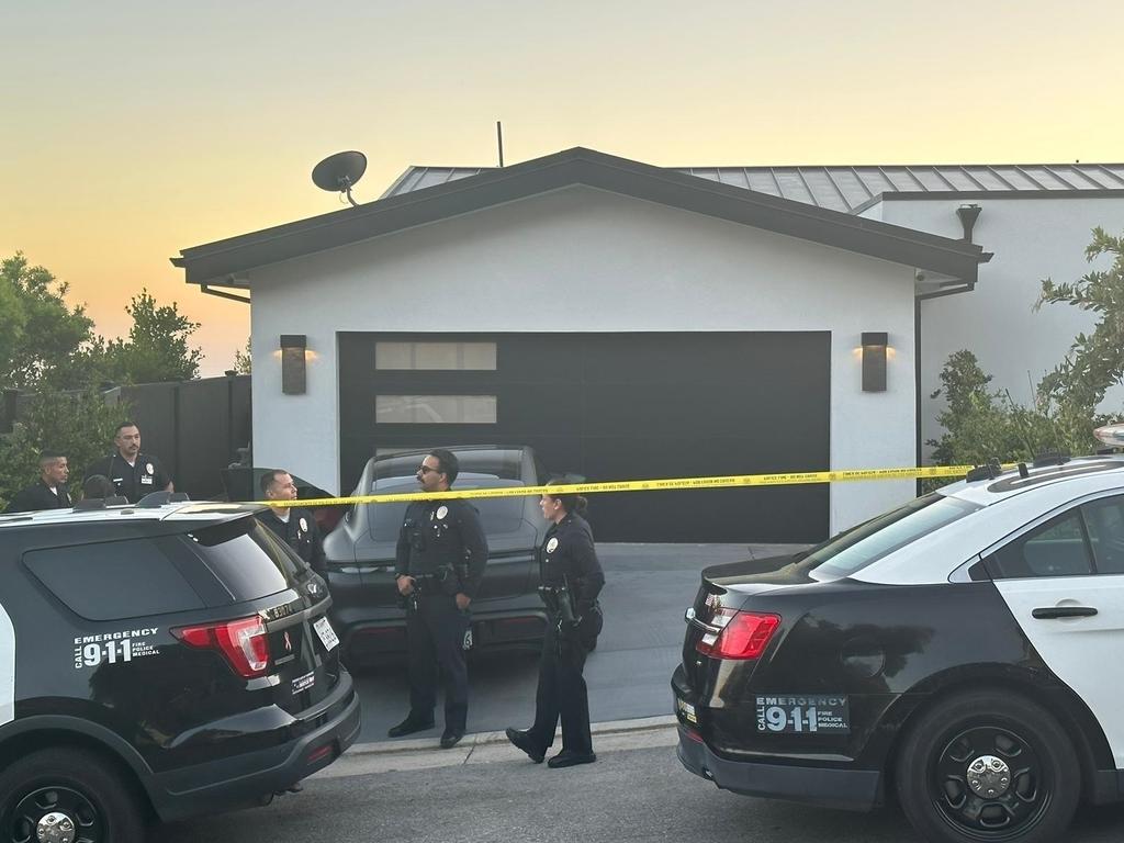 Police vehicles were seen with the area taped off after the actor's tragic passing.  Picture: Backgrid Australia