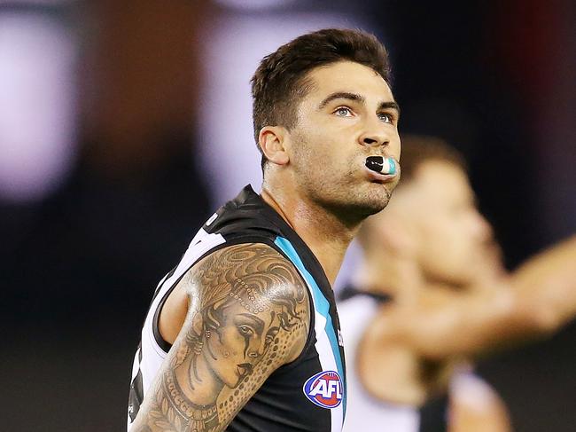 AFL Round 6. 28/04/2018. North Melbourne v Port Adelaide at Etihad Stadium. Port Adelaide's Chad Wingard heads to the bench after hurting his hamstring   . Pic: Michael Klein