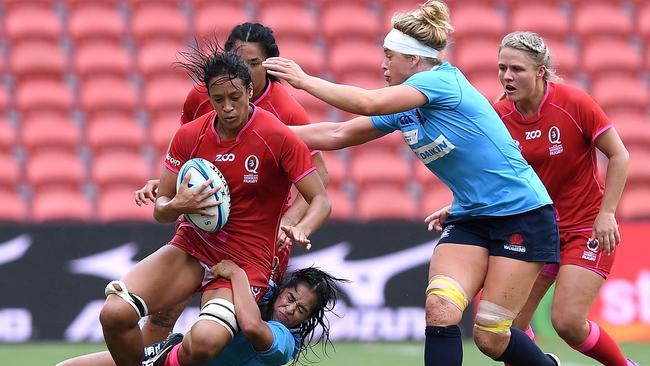 Kirby Sefo takes on the defence during the Super W match between Queensland and NSW.