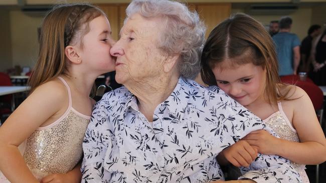 Happy birthday: Patricia Overbeck celebrates her 100th birthday with great-great- granddaughters, five-year-old twins Evie and Frankie. Picture: Mark Wilson.