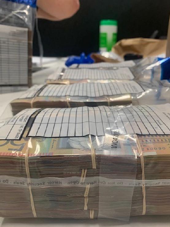 Queensland Police seized just under $2 million of cash, guns and weapons at Ashmore on September 29, 2020. Photo: Queensland Police.