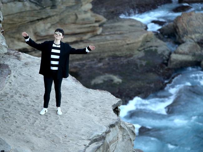 A woman gets her photo taken on the cliffs of Diamond Bay the same day one of the deaths occurred. Picture by Damian Shaw